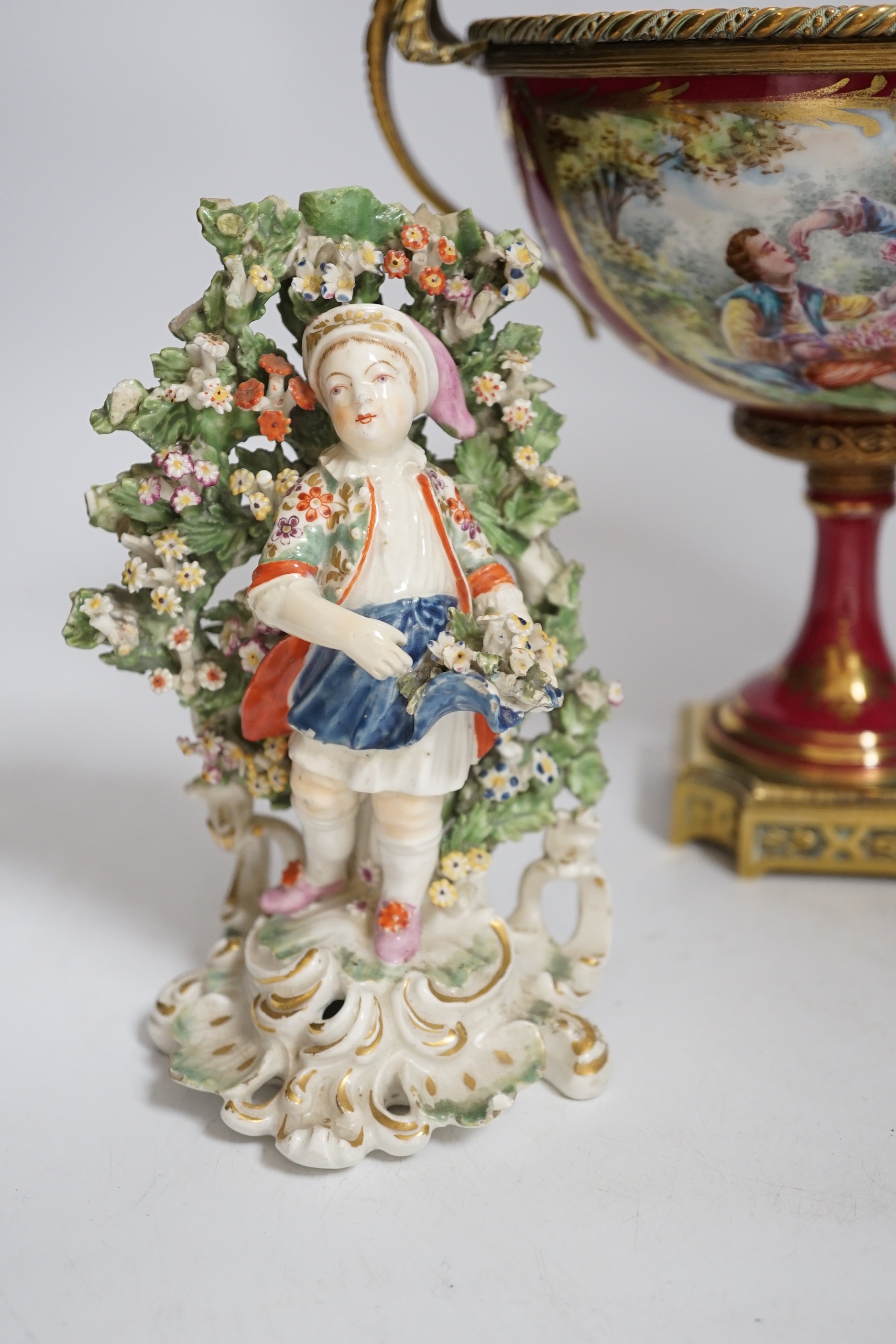 A pair of Derby figures, c.1775, a Paris porcelain gilt metal mounted comport and a glass jar, 21cm high